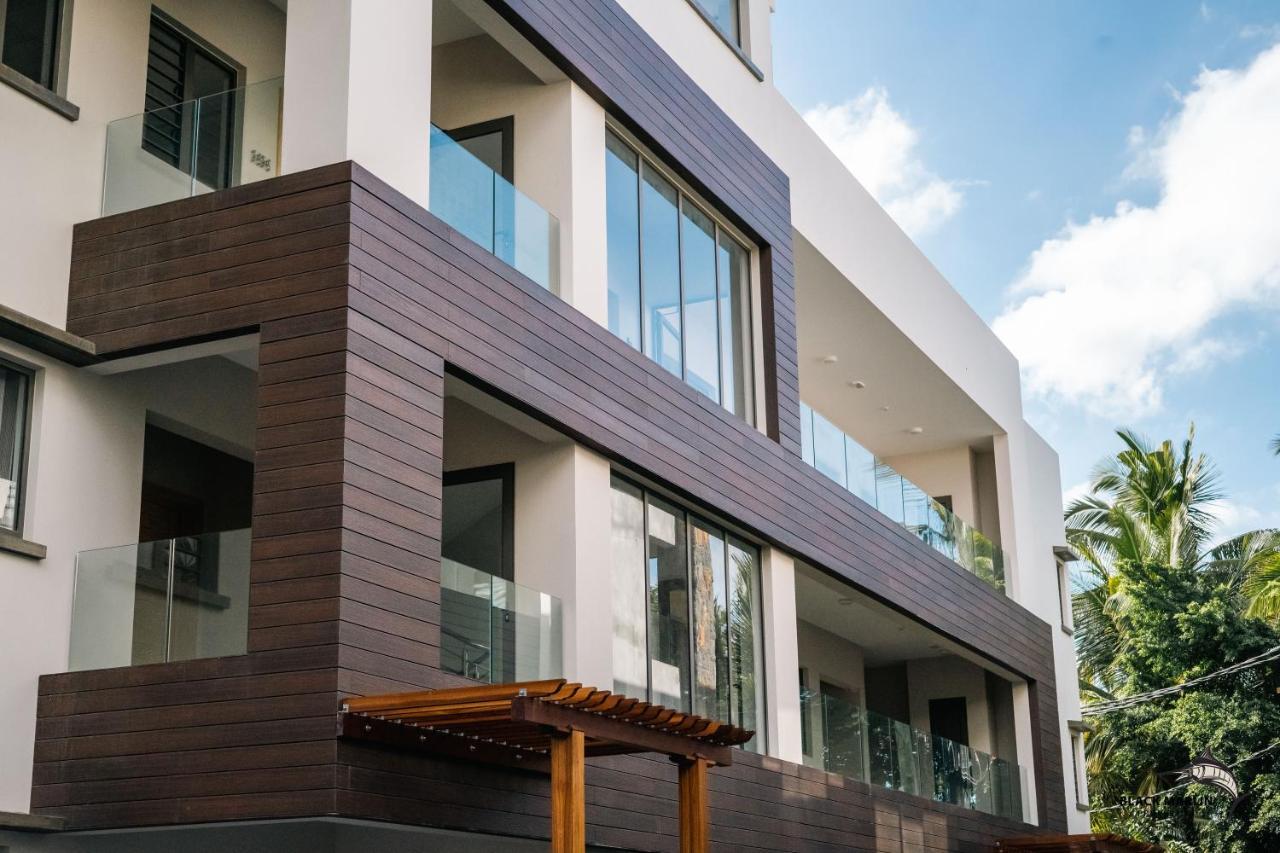 Black Marlin Apartments Pereybere Beach Bagian luar foto