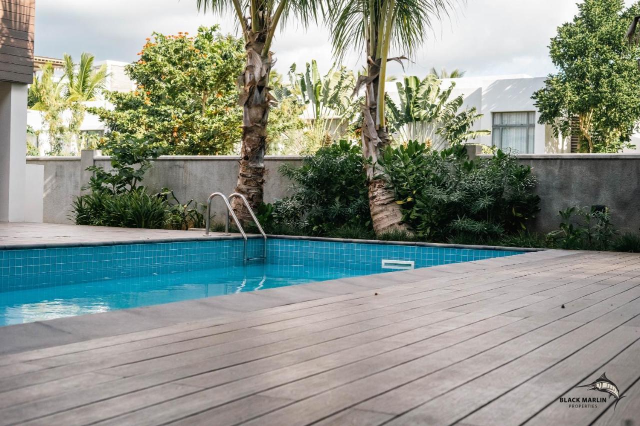 Black Marlin Apartments Pereybere Beach Bagian luar foto