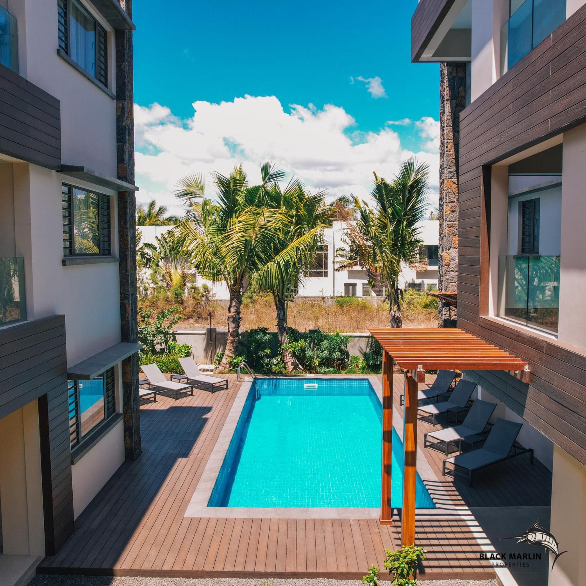 Black Marlin Apartments Pereybere Beach Bagian luar foto